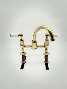 Lever-Operated Kitchen Mixer Tap C.1930 with Porcelain Handles in Unsealed Polished Brass by Shanks.