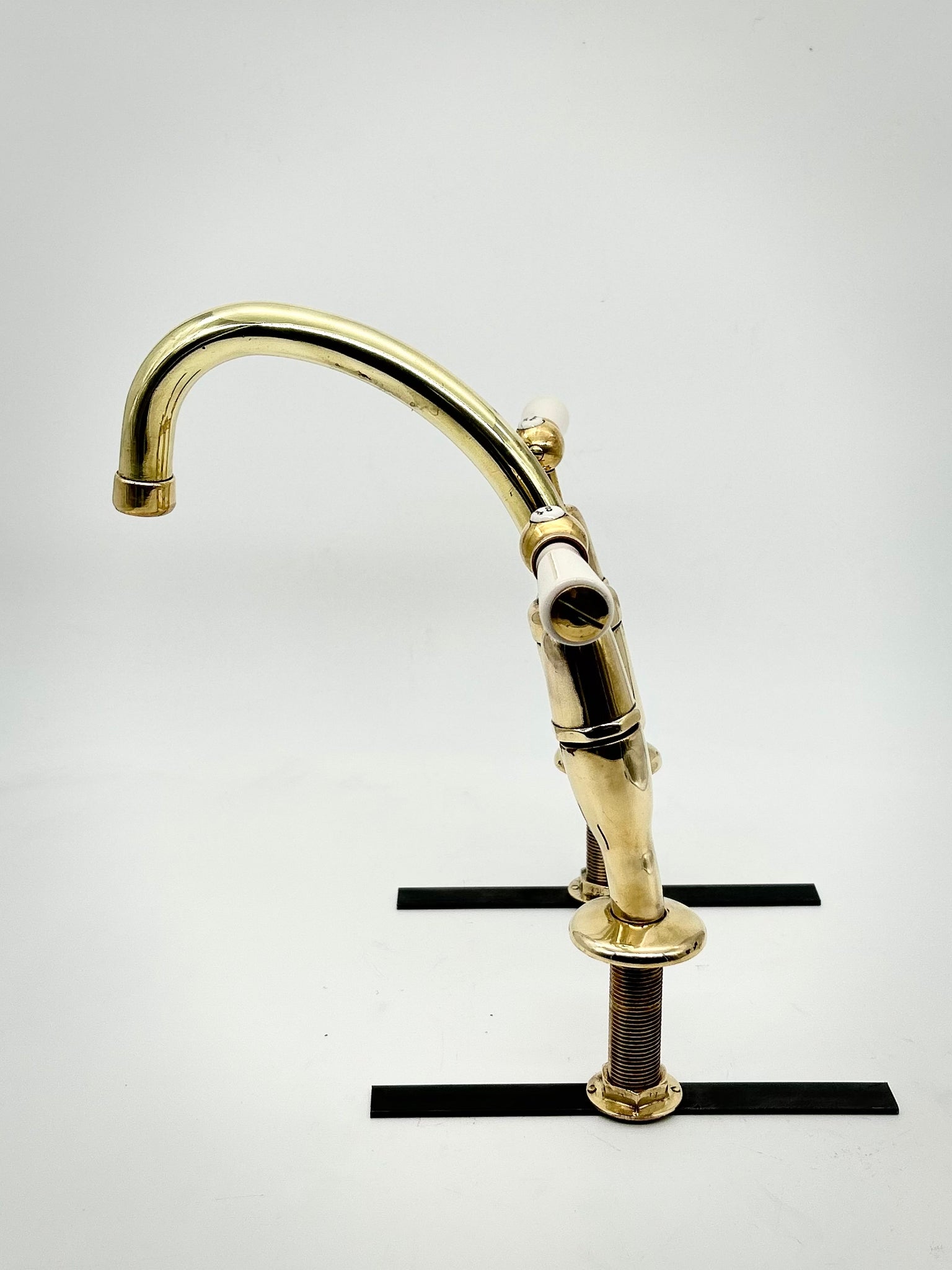 Lever-Operated Kitchen Mixer Tap C.1930 with Porcelain Handles in Unsealed Polished Brass by Shanks.