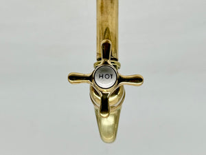 A Pair of Wall-Mounted Kitchen Sink Bib Taps C.1920 in Unsealed Polished Brass Finish.