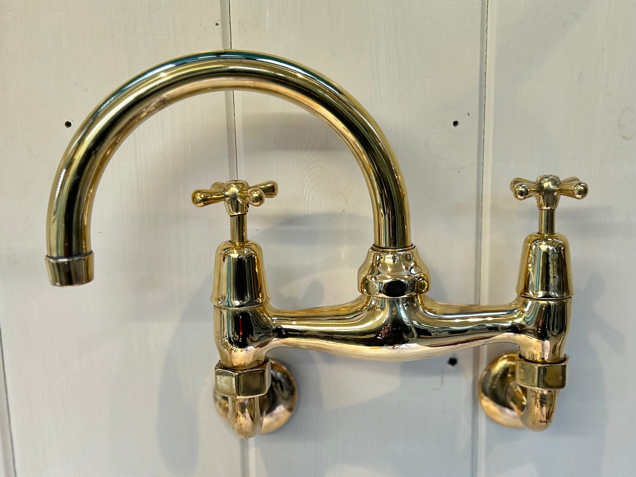 Wall-Fixing Bi-Flo Kitchen Mixer Tap with Returnable Spout C.1930 in Unsealed Polished Brass