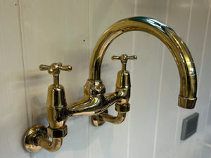 Wall-Fixing Bi-Flo Kitchen Mixer Tap with Returnable Spout C.1930 in Unsealed Polished Brass