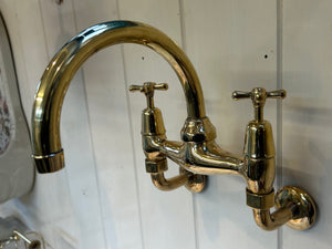 Wall-Fixing Bi-Flo Kitchen Mixer Tap with Returnable Spout C.1930 in Unsealed Polished Brass