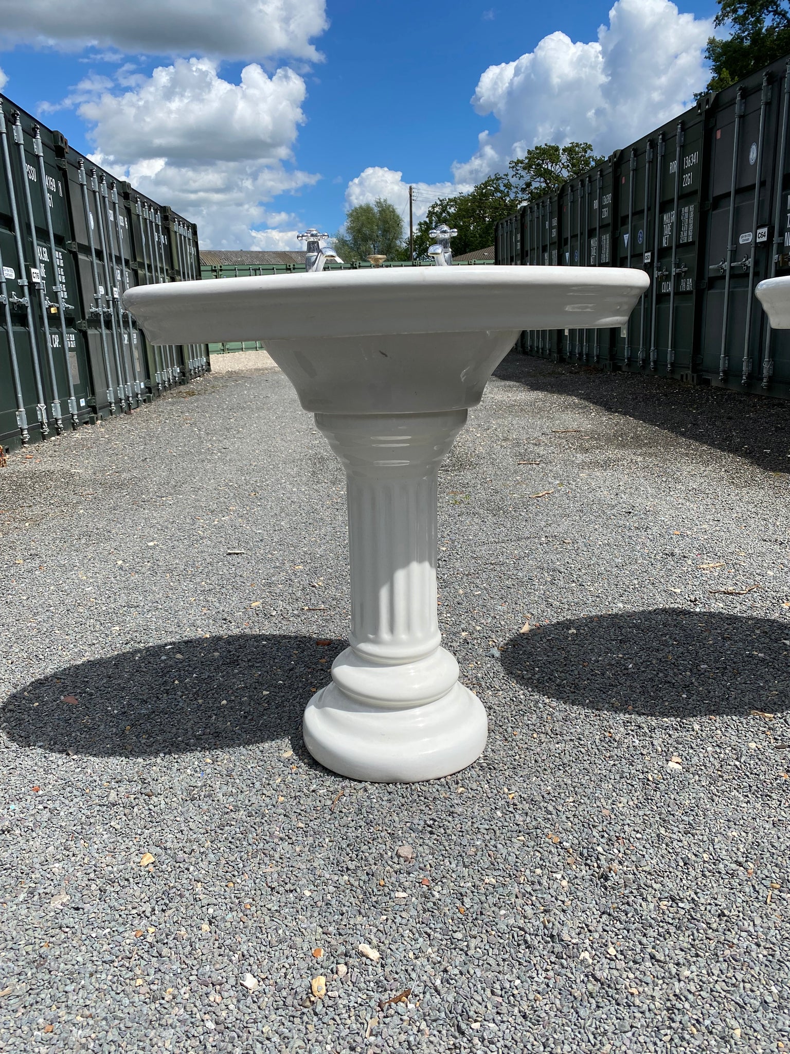 A Pair of  Oval Jacob Delafon Basins with Fluted Pedestals C.1900