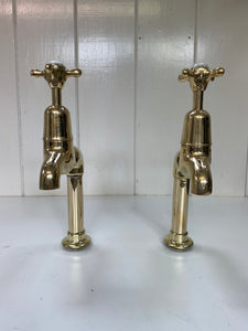 Large Edwardian 3/4" Bib Taps on Pedestals suitable for Larger Kitchen Sinks C.1920 in Unsealed Polished Brass finish.